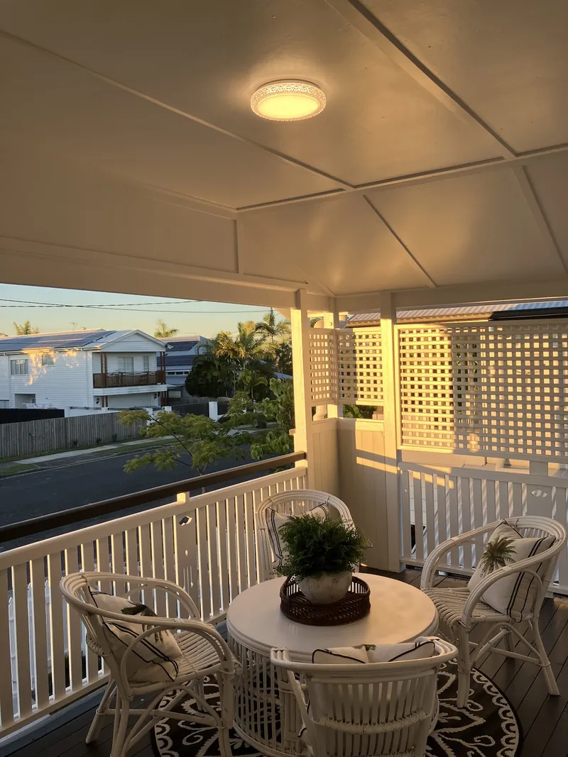 Covered deck with an LED ceiling light, looking out over Brisbane