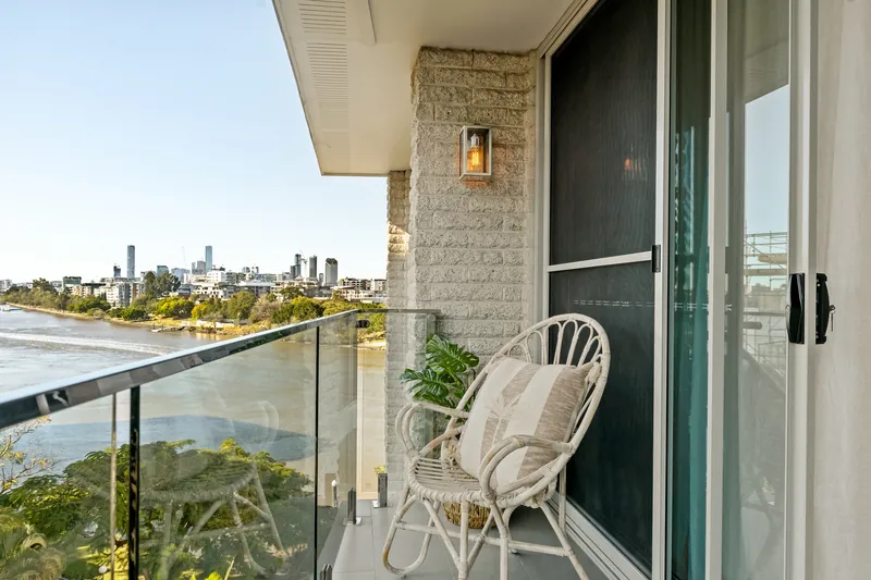 Balcony with decorative wall light overlooking the Brisbane River